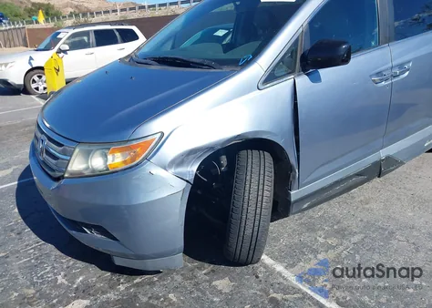 2012 Honda Odyssey Exl z USA, uszkodzony, nr VIN 5FNRL5H60CB007220